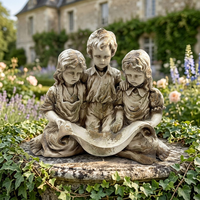 Antique Trio of Children with Scroll Statue