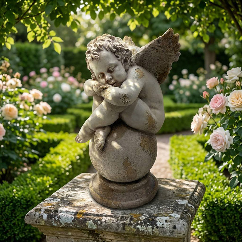 Vintage MgO Sleeping Cherub on Globe Statue