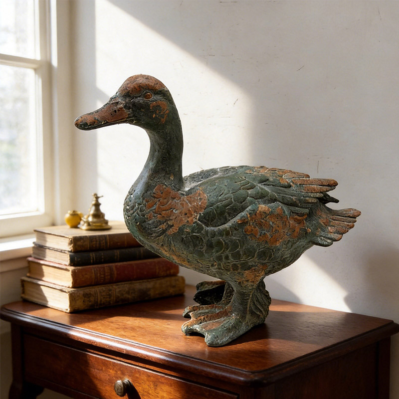 Vintage Duck Statue with Weathered Patina